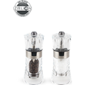 The transparency of the acrylic used to make the Oslo duo of salt and pepper mills makes the best use of the beauty of the contents of the mills. The subtle note of stainless steel adds a charm to this piece with crystal-clear transparency. Oslo