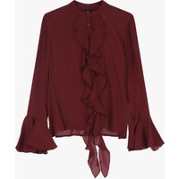 Chemise à volants et boutons