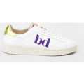 Sneakers con linguetta posteriore a contrasto e logo