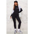 PRETTYLITTETHING Black Embroidered Zip Front Catsuit