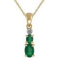 Classic two Oval Emerald & Diamond Pendant in 9ct Yellow Gold
