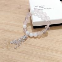 Snowflake Phantom & Rose Quartz Bracelet with Clear Quartz Tassel