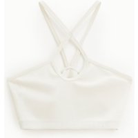 Top corto halter con tirantes cruzados